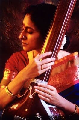 Serene tanpura riyaz in traditional attire — the soul of Carnatic practice